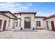 Luxurious home featuring a brick paved driveway, grand entrance, and manicured landscaping at 10352 Burris Ct, Orlando, FL 32836