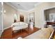 Bright living room showcasing the open floor plan and beautiful hardwood flooring at 10352 Burris Ct, Orlando, FL 32836