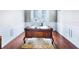Traditional office showcasing a wooden desk, hardwood floors, and wainscoting at 10352 Burris Ct, Orlando, FL 32836