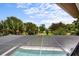 This screened in pool has a gorgeous view of nature at 10352 Burris Ct, Orlando, FL 32836