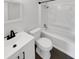 Beautiful bathroom features modern vanity and shower with white tile surround at 14837 Sussex Dr, Orlando, FL 32826