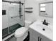 Modern bathroom with updated vanity, tiled shower, and sleek black fixtures at 14837 Sussex Dr, Orlando, FL 32826