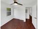 Bedroom with ceiling fan and large closet at 14837 Sussex Dr, Orlando, FL 32826
