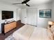 Cozy bedroom featuring a comfortable bed, spacious closets, and modern decor for a relaxing retreat at 14837 Sussex Dr, Orlando, FL 32826