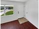 Inviting entryway featuring stylish tile flooring and a bright window view at 14837 Sussex Dr, Orlando, FL 32826