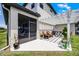Open patio and trellis featuring relaxing backyard space with seating at 15208 Lake Claire Overlook Dr, Winter Garden, FL 34787