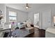 Cozy bedroom with desk, chair, and ensuite bathroom at 15208 Lake Claire Overlook Dr, Winter Garden, FL 34787