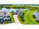 Stunning two-story home features a three-car garage and a well-manicured lawn, located in a serene location at 15208 Lake Claire Overlook Dr, Winter Garden, FL 34787