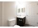 Well-lit bathroom featuring modern fixtures and a spacious vanity with ample storage space at 15476 Sw 34Th Court Rd, Ocala, FL 34473