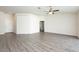 Spacious living room with hardwood floors and an open layout at 15476 Sw 34Th Court Rd, Ocala, FL 34473