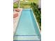 Stunning pool with paver deck and manicured landscaping at 15947 Vetta Dr, Bella Collina, FL 34756