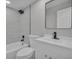 Bright bathroom with shower-tub combo, new fixtures, and modern vanity at 1617 Hallcrest Dr, Deltona, FL 32725