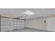 Garage with automatic door and interior access to the house at 1617 Hallcrest Dr, Deltona, FL 32725