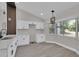 Modern kitchen featuring new appliances, countertops, and a sleek design at 1617 Hallcrest Dr, Deltona, FL 32725