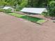 A bocce ball court is sheltered by a canopy in the backyard of the property at 168 Perimeter Ct # 5C, Deltona, FL 32725