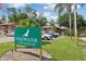 Community sign for Edgewater Condominiums, beautifully landscaped with a lush green setting at 168 Perimeter Ct # 5C, Deltona, FL 32725