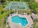 Aerial view of community pool and tennis courts offering a relaxing and active lifestyle at 168 Perimeter Ct # 5C, Deltona, FL 32725