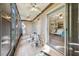 Enclosed patio with tiled floors, ceiling fans, and sliding doors to the living room at 168 Perimeter Ct # 5C, Deltona, FL 32725
