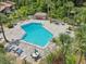 Aerial shot of the clean and inviting community pool with plenty of seating at 168 Perimeter Ct # 5C, Deltona, FL 32725