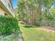 Private backyard featuring lush greenery and a secure fence, perfect for outdoor relaxation at 1757 Sunset Palm Dr, Apopka, FL 32712
