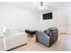 Bright living room with modern furnishings and neutral decor at 1757 Sunset Palm Dr, Apopka, FL 32712