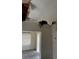 Damaged ceiling with exposed support beams and falling sheetrock near a sliding glass door at 1822 Williams Manor Ave, Orlando, FL 32811