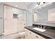 Well-lit bathroom with subway tiles, a granite countertop, and a shower-tub combination at 2320 Wekiva Ridge Rd, Apopka, FL 32712