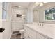 Modern bathroom featuring a glass-enclosed shower, white subway tile, and a stylish vanity at 2320 Wekiva Ridge Rd, Apopka, FL 32712
