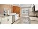 Bright kitchen with granite countertops, stainless steel appliances, and hardwood flooring at 2320 Wekiva Ridge Rd, Apopka, FL 32712