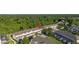 An aerial view of the townhomes shows landscaping and private parking areas at 2346 Silver Palm Dr, Kissimmee, FL 34747