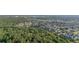 An aerial view shows the community nestled against a beautiful nature preserve at 2346 Silver Palm Dr, Kissimmee, FL 34747