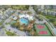 Aerial view of the community showing the pool, basketball court, tennis courts, and clubhouse at 2346 Silver Palm Dr, Kissimmee, FL 34747