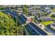 Aerial view of the condo community with ample parking and lush landscaping at 2346 Silver Palm Dr, Kissimmee, FL 34747