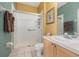 Functional bathroom with a walk-in shower, vanity sink, and neutral color scheme for a clean look at 2346 Silver Palm Dr, Kissimmee, FL 34747
