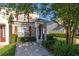 Delightful townhome displaying manicured greenery, providing an inviting and warm atmosphere at 2346 Silver Palm Dr, Kissimmee, FL 34747