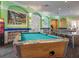 Inviting game room featuring a pool table, ping pong, and decorative murals at 2346 Silver Palm Dr, Kissimmee, FL 34747