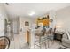 Open concept kitchen with bar seating and view of the living area at 2346 Silver Palm Dr, Kissimmee, FL 34747