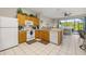 Functional kitchen with modern appliances, ample counter space, and a view of the screened-in patio at 2346 Silver Palm Dr, Kissimmee, FL 34747