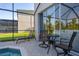 Enjoy the screened-in patio with a private pool, perfect for outdoor dining and relaxation at 2346 Silver Palm Dr, Kissimmee, FL 34747