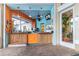 Vibrant poolside cafe featuring colorful decor and a convenient walk-up counter at 2346 Silver Palm Dr, Kissimmee, FL 34747