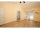 Bright bedroom features wood-look floors, walk-in closet, and sliding glass doors for easy outdoor access at 2493 Lancien Ct # 5, Orlando, FL 32826