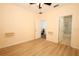 Bright room with laminate flooring, ceiling fan, and ensuite bathroom at 2493 Lancien Ct # 5, Orlando, FL 32826