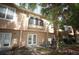 A back exterior view showcasing a balcony and patio, perfect for outdoor relaxation and entertaining at 2493 Lancien Ct # 5, Orlando, FL 32826