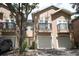 Charming two-story townhome featuring a private balcony and attached garages in a well-maintained community at 2493 Lancien Ct # 5, Orlando, FL 32826