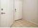 Clean foyer with tile flooring and a secure entrance featuring a coded lock at 2493 Lancien Ct # 5, Orlando, FL 32826