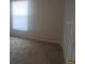 Bedroom featuring a window for natural light, carpet flooring, and double closets for storage at 2723 Talladega Dr, Orlando, FL 32826