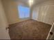 Bedroom with neutral walls, carpet flooring, and a double-door closet at 2723 Talladega Dr, Orlando, FL 32826