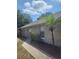 Exterior view of a house with a well-maintained walkway and landscaping at 2723 Talladega Dr, Orlando, FL 32826