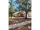 Charming single-story home with manicured landscaping and mature trees at 2723 Talladega Dr, Orlando, FL 32826
