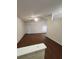 Bright living room with wood flooring, ceiling fan, and sliding glass door at 2723 Talladega Dr, Orlando, FL 32826